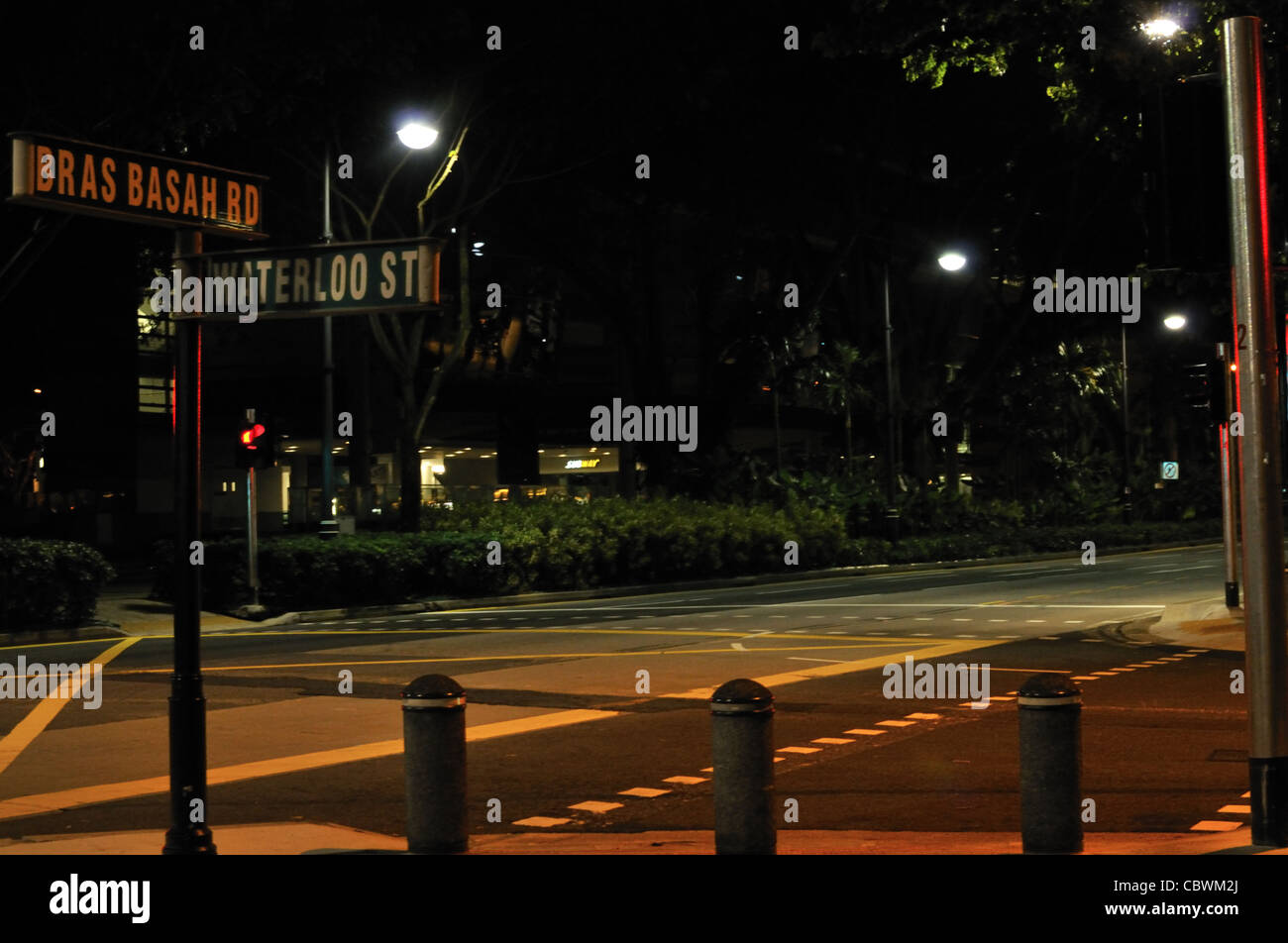 Singapore Bras Basah Road at night Stock Photo Alamy