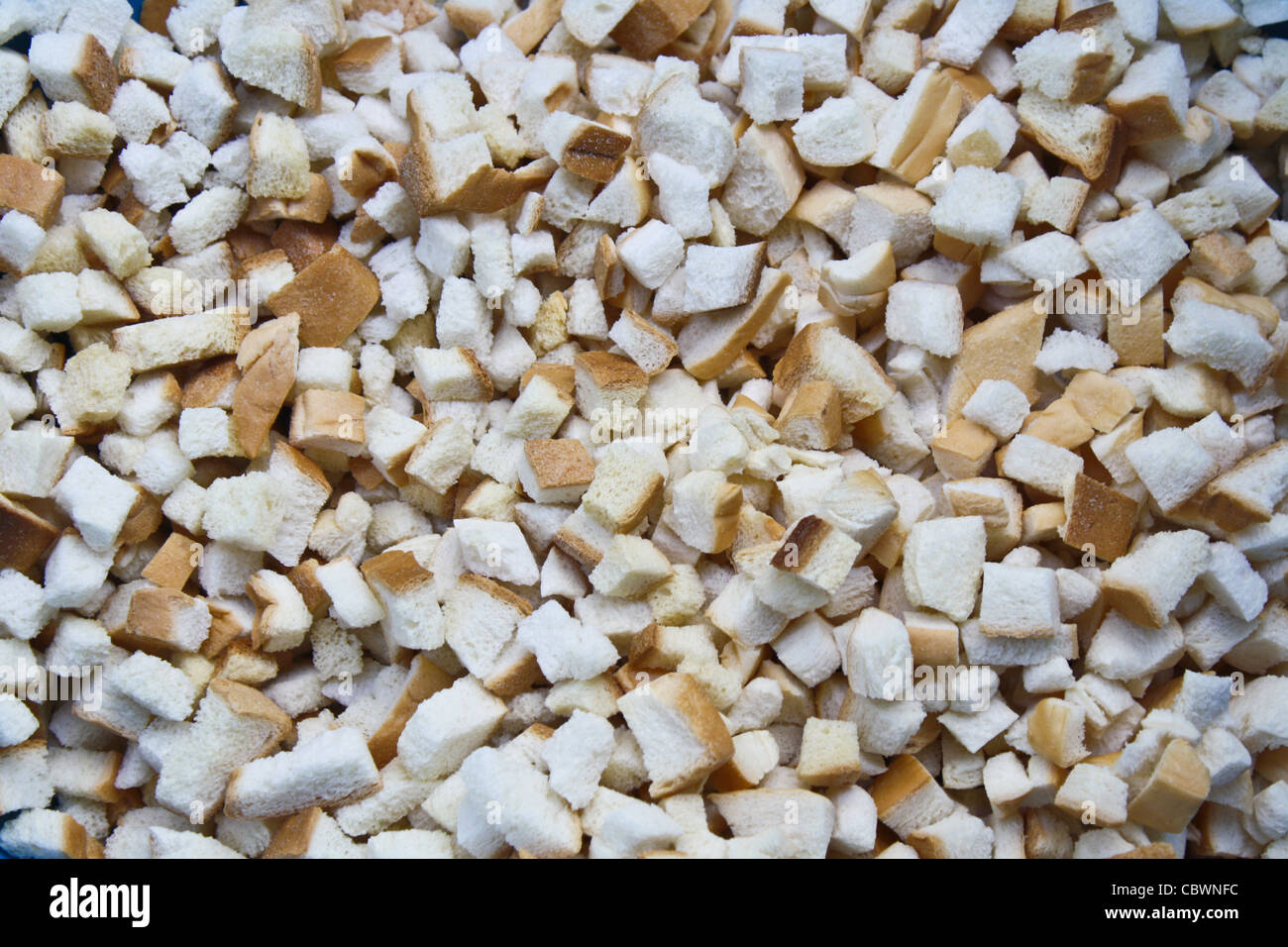 A small piece of bread with a crispy crust of bread. Stock Photo