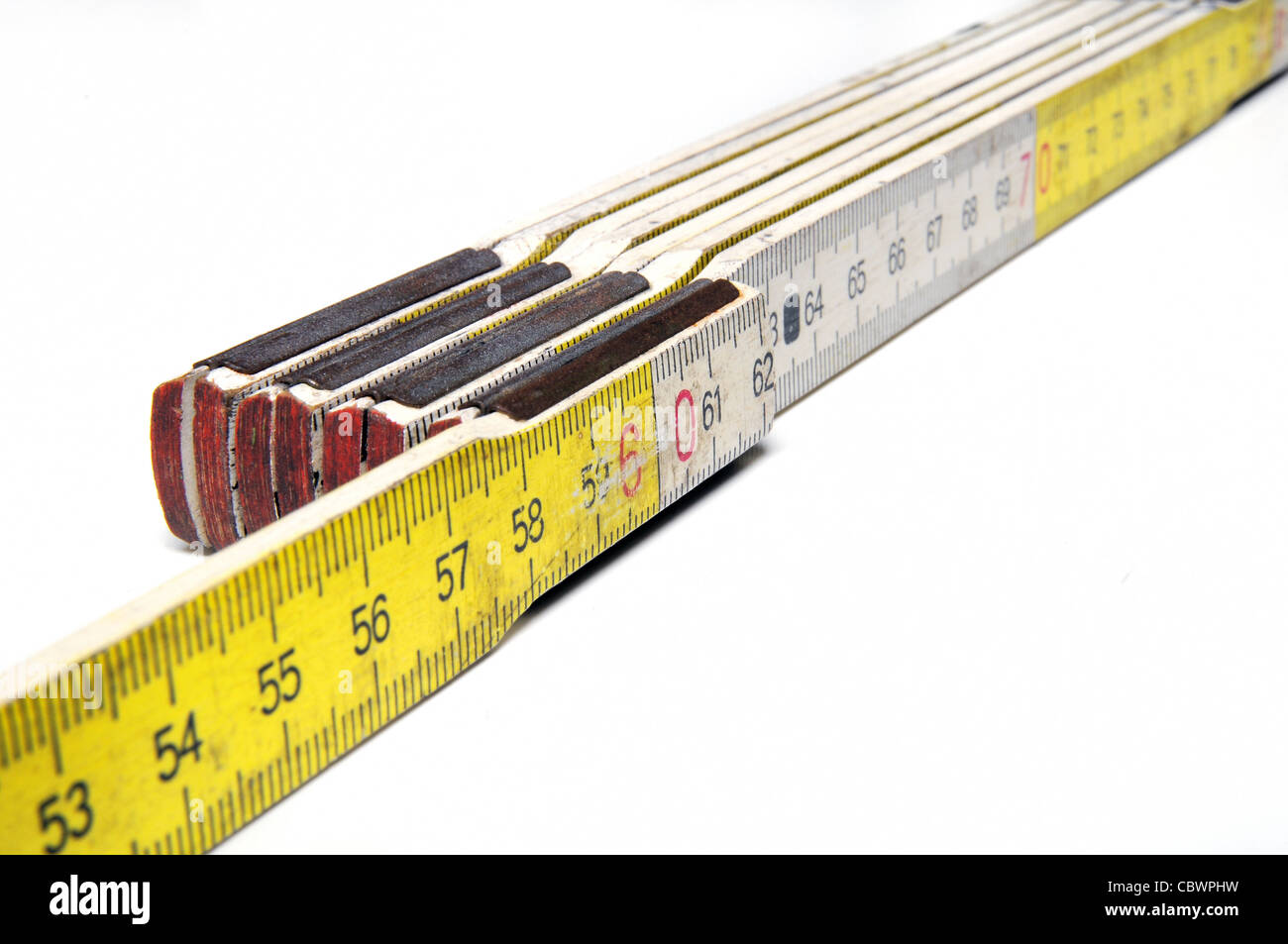 Close up of a yellow and white colored yardstick Stock Photo