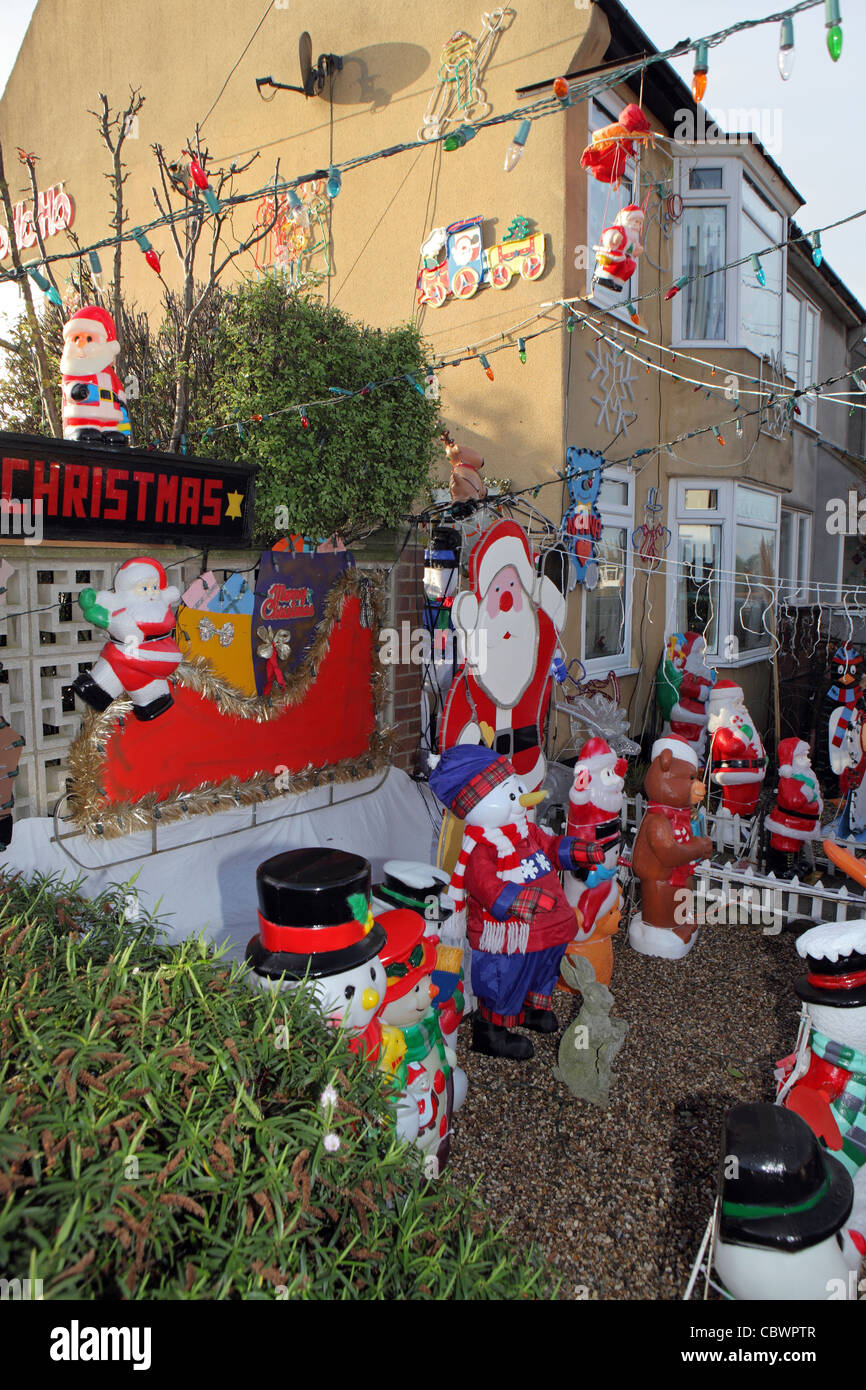 Kitsch Christmas decorations in suburban house garden,Leiston, Suffolk, UK Stock Photo