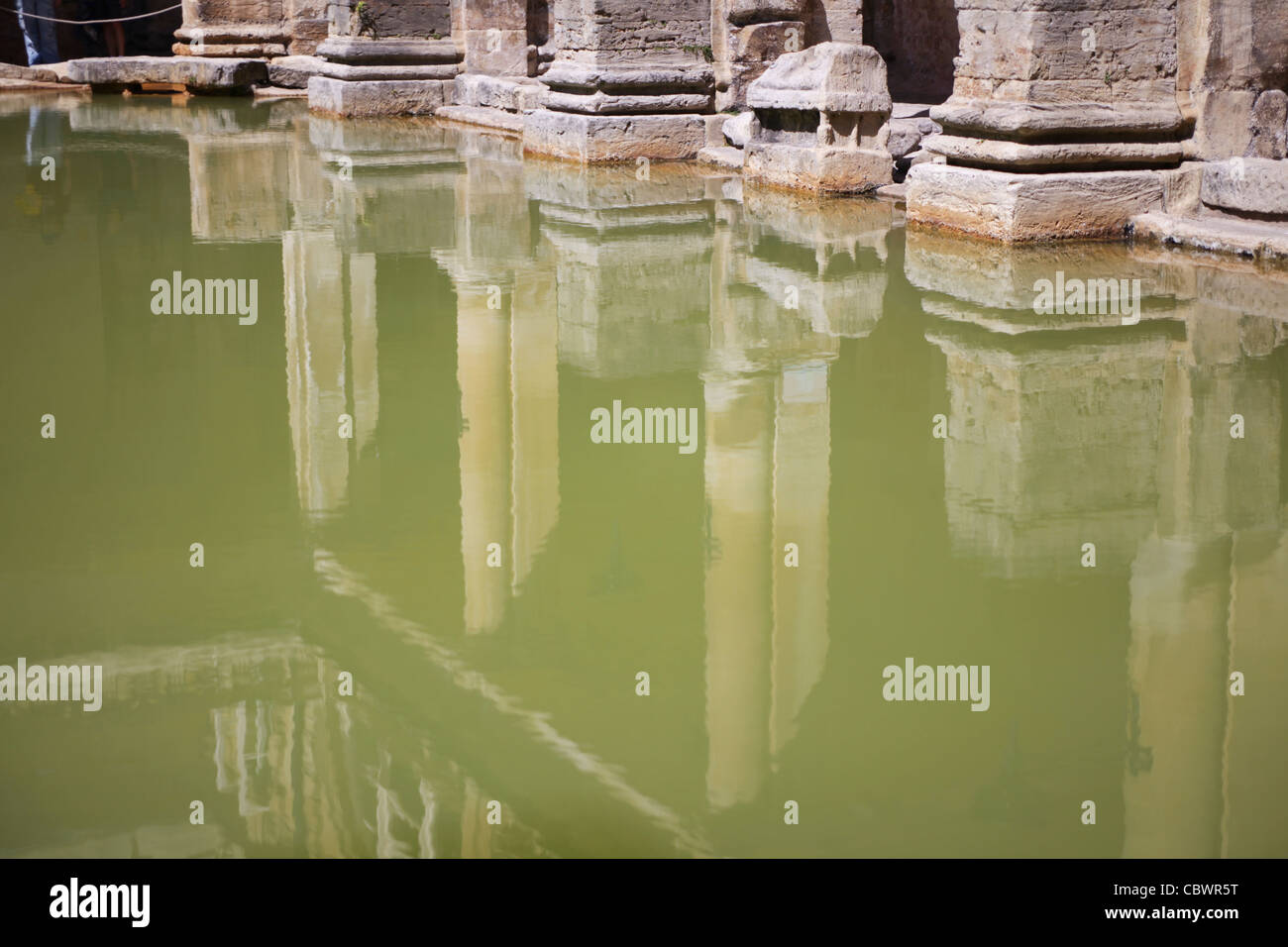Reflections of the pillars and columns at the Roman Baths in Bath Stock Photo