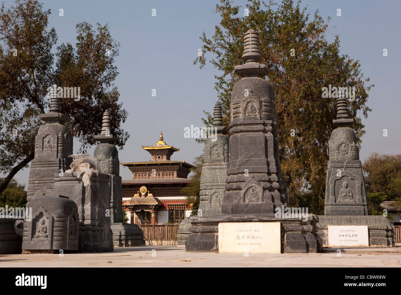 India, Bihar, Bodhgaya, Buddhism, Japanese temple carved stone stupas in temple garden Stock Photo
