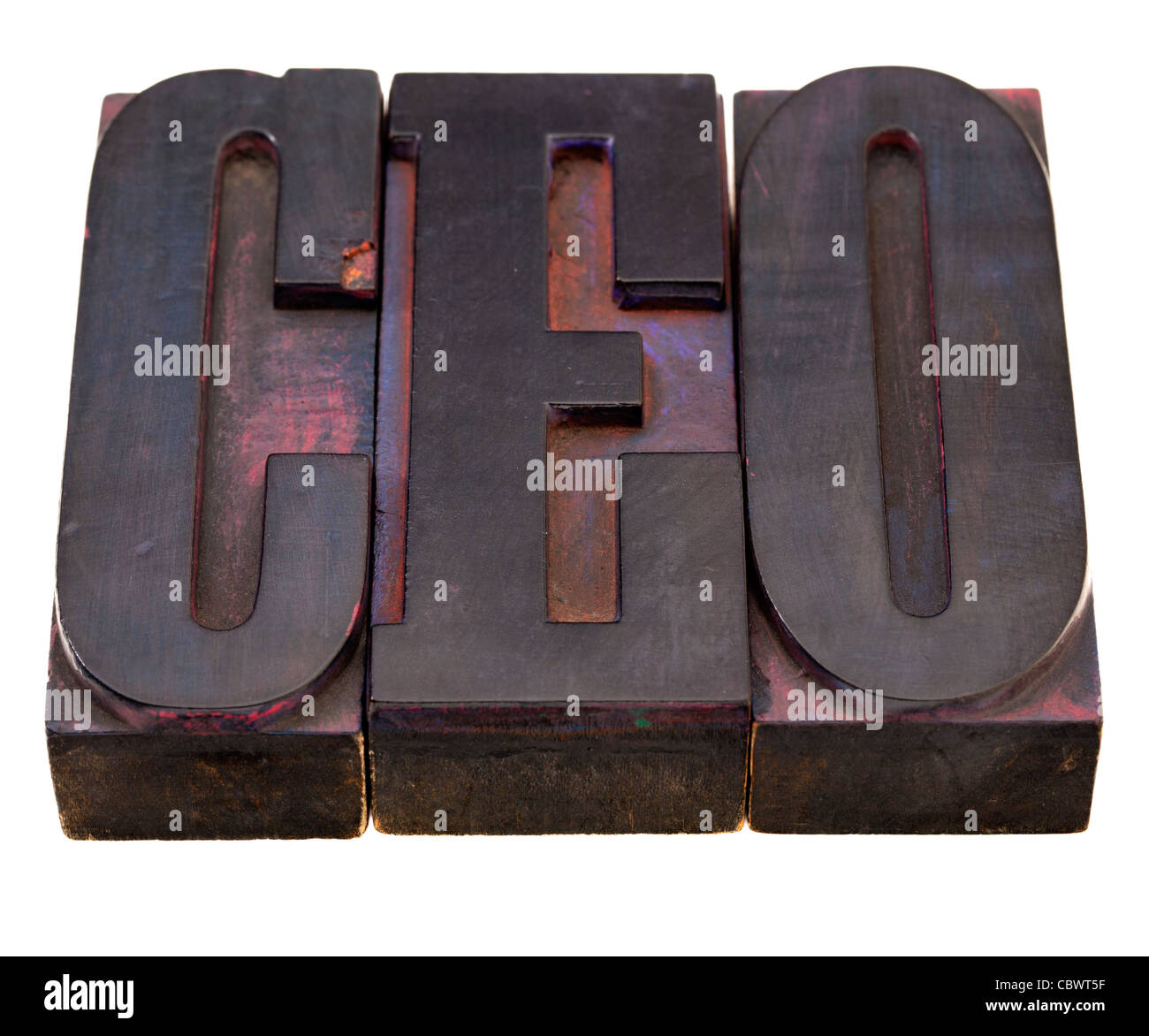 chief executive officer (CEO) acronym in antique wooden letterpress printing blocks, stained by color inks, isolated on white Stock Photo