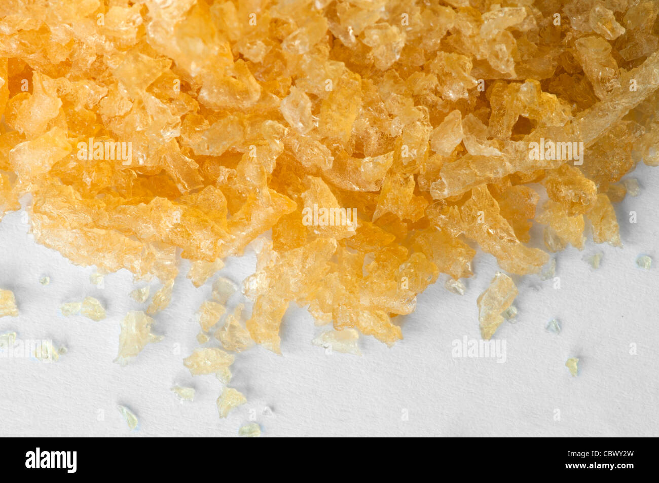 Cooking gelatin crystals on white background Stock Photo Alamy