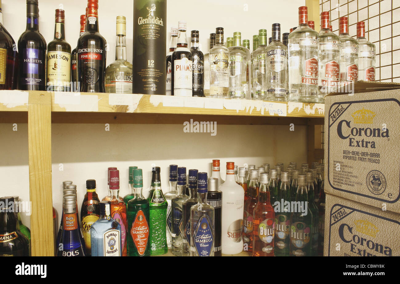 cases of drinks in bottle store of pub Stock Photo Alamy