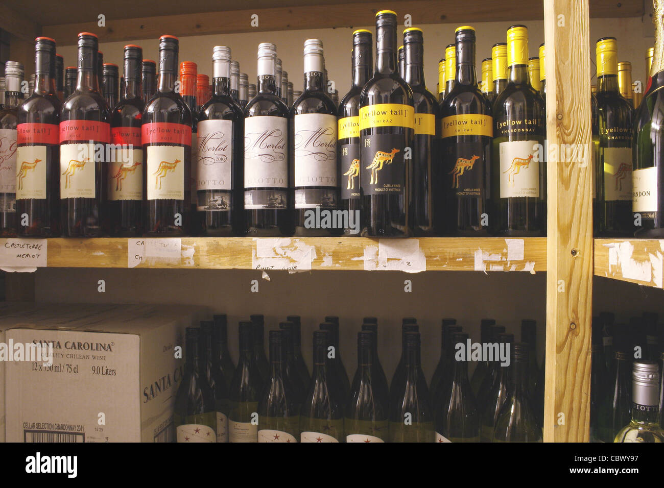 cases of drinks in bottle store of pub Stock Photo Alamy