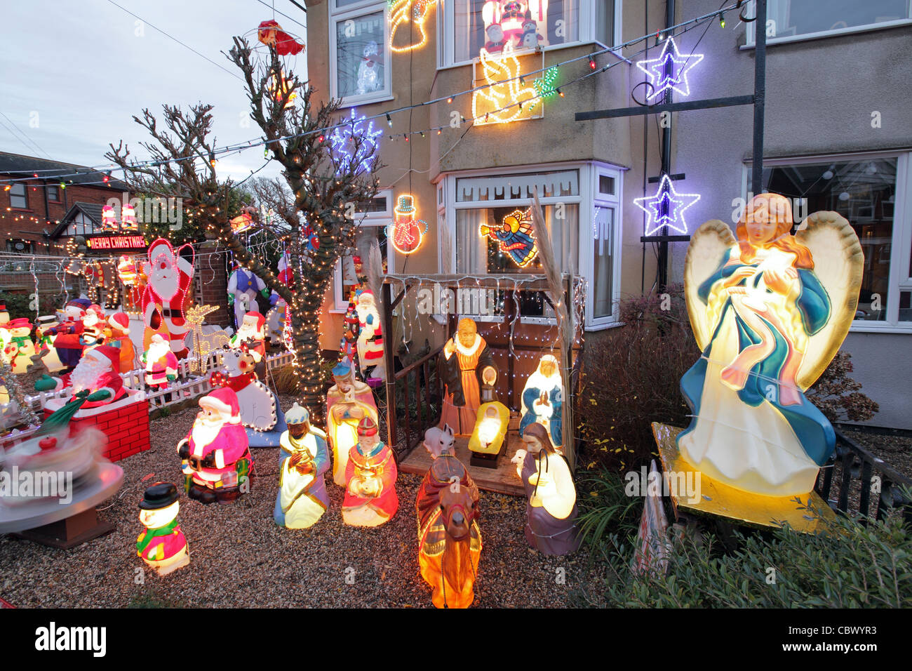 Kitsch Christmas decorations in suburban house garden,Leiston, Suffolk, UK Stock Photo