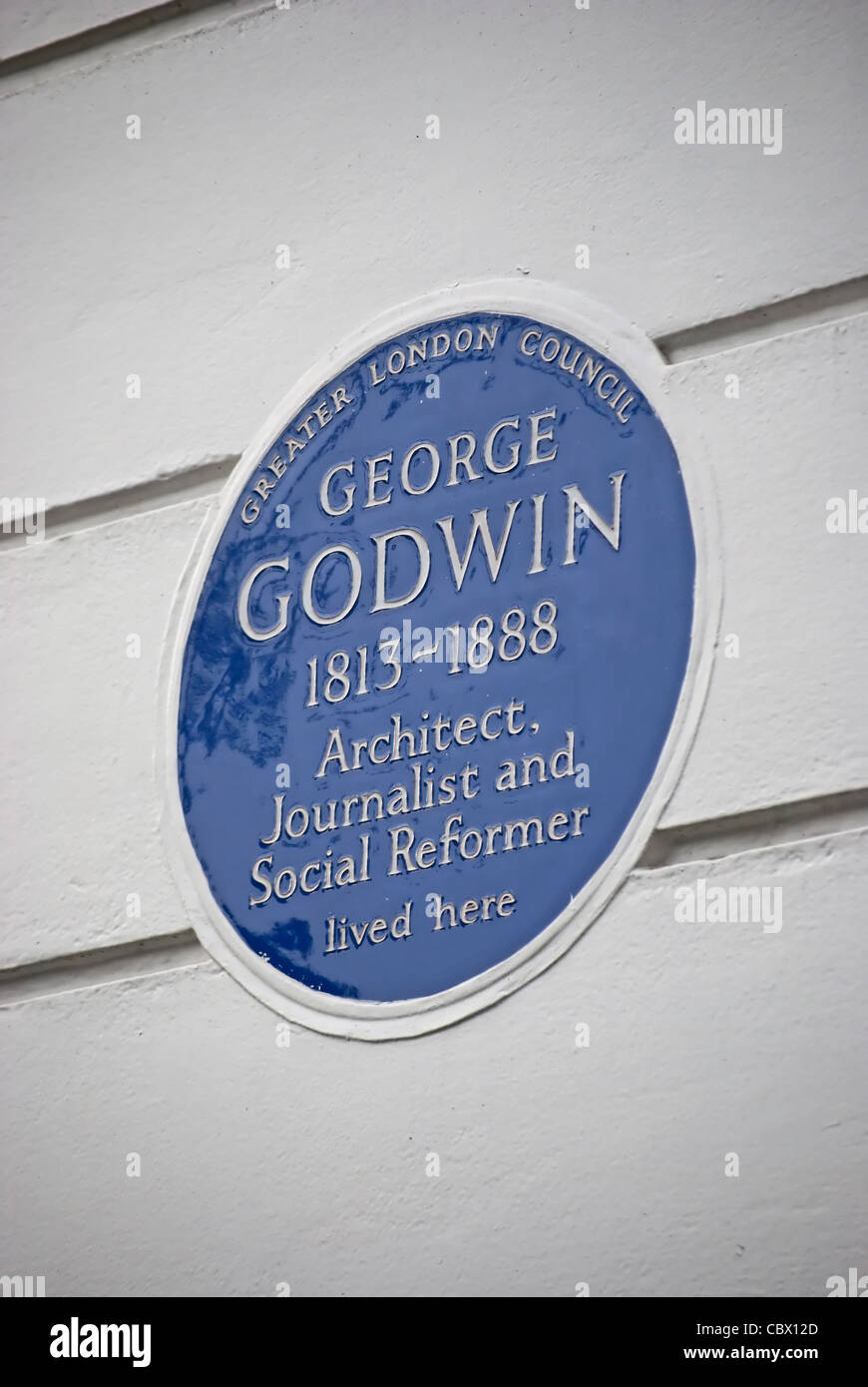 greater london council blue plaque marking a home of 19th century architect, journalist and social reformer, george godwin Stock Photo