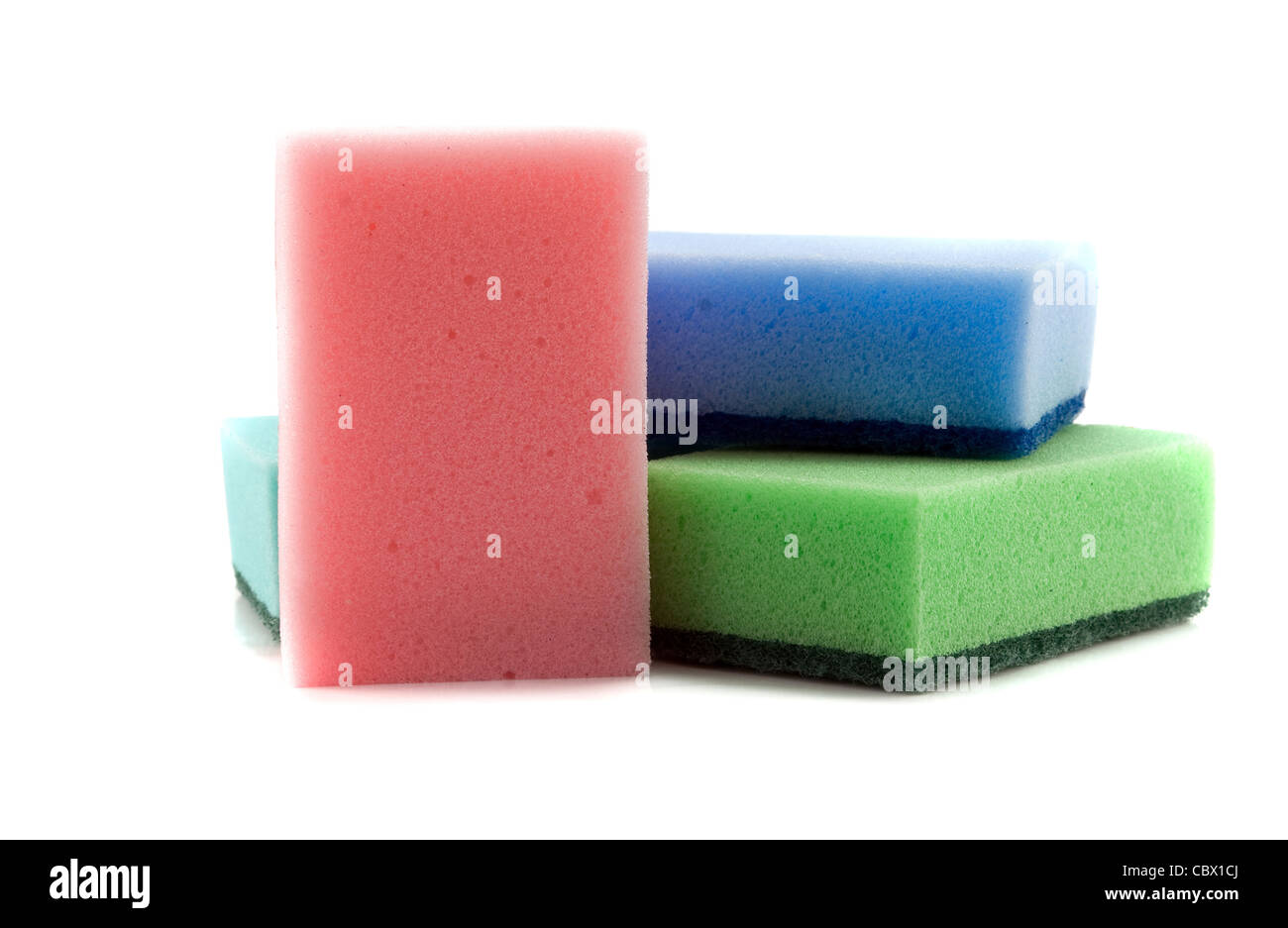 three sponges are isolated on a white background Stock Photo - Alamy