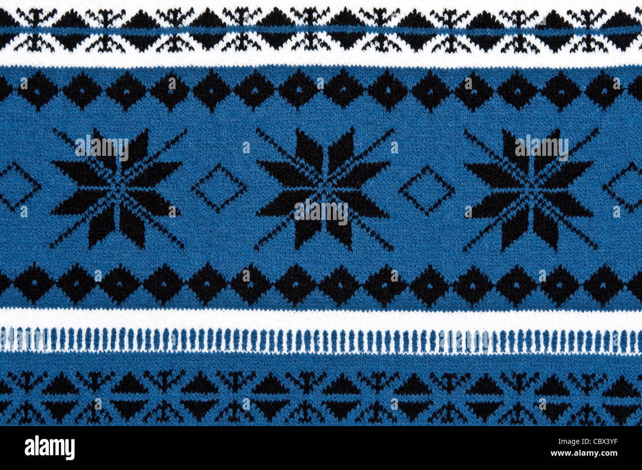 knitted blue background with a pattern Stock Photo - Alamy