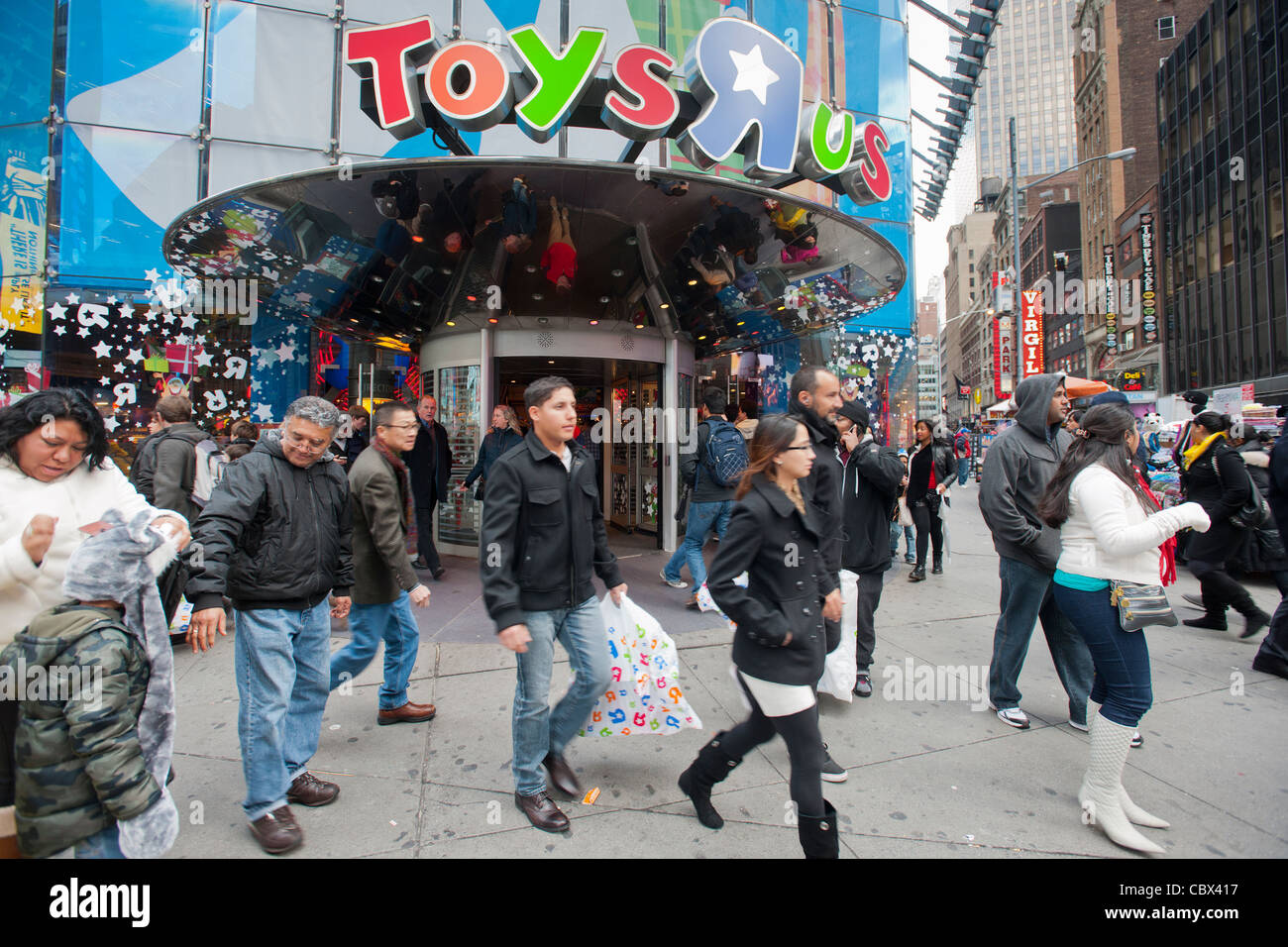 Shoppers in front of Toys R Us in Times Square in New York two days