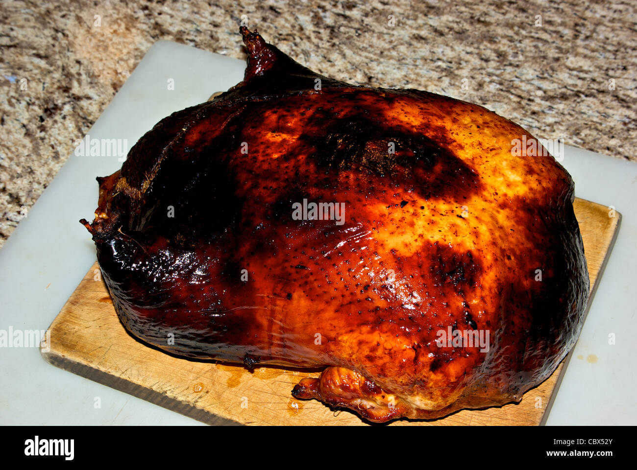 Roasted stuffed turkey completely deboned including leg bones stuffed for Christmas dinner Stock