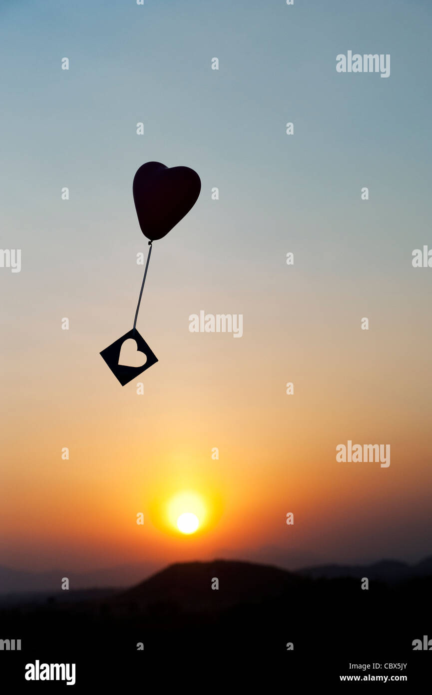 Balloon heart in the sky hi-res stock photography and images - Alamy