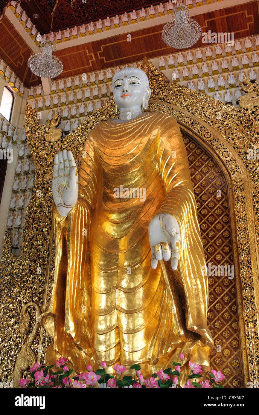 Giant standing Buddha statue at Dhammikarama Burmese Buddhist Temple