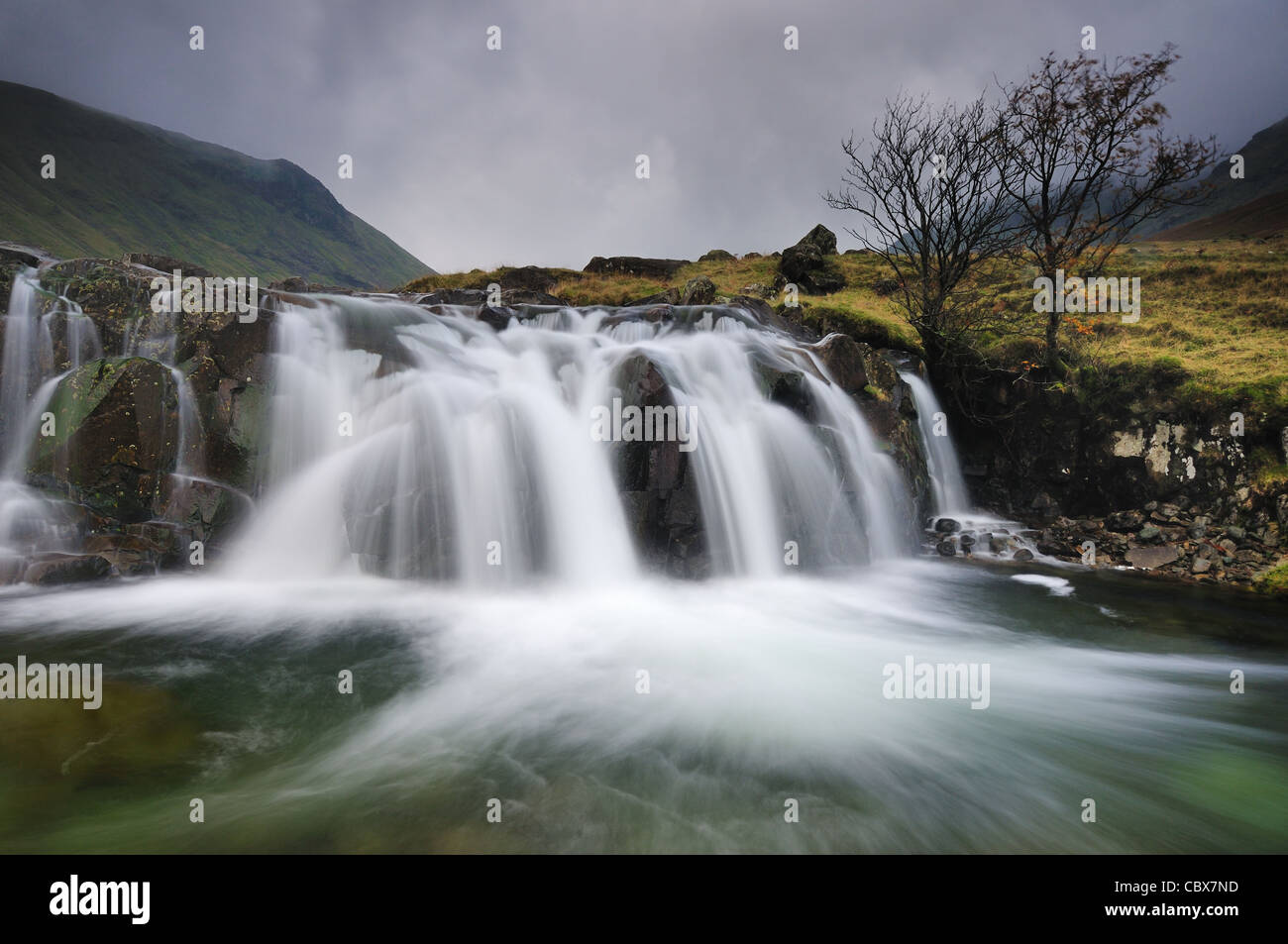 Scenic waterfall in the wild unspoilt Langstrath Valley in the English Lake District Stock Photo