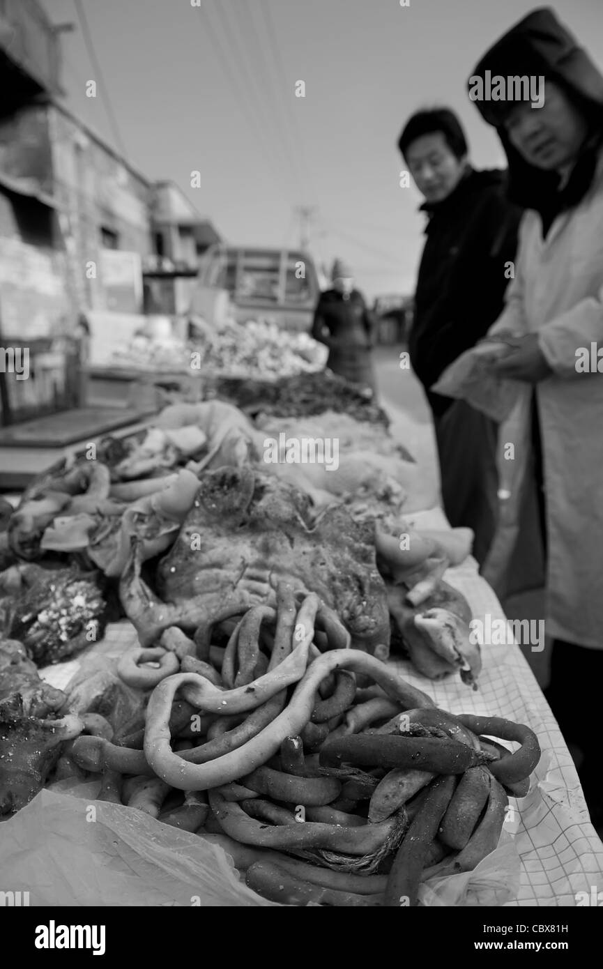 Fatou Qiao, Beijing. Mr. Fu sells meat on the street Stock Photo