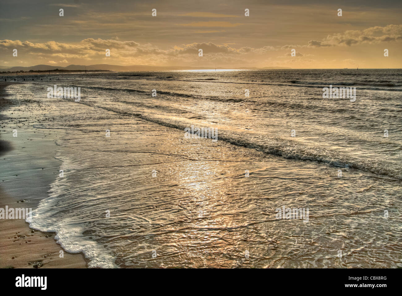 Calm Waves At Welsh Beach During Summer Time Stock Photo Alamy calm-waves-at-welsh-beach-during-summer-time-stock-photo-alamy
