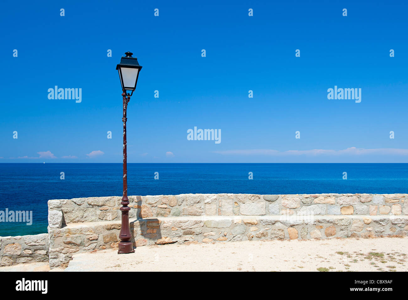 Street light by the Mediterranean Sea Stock Photo