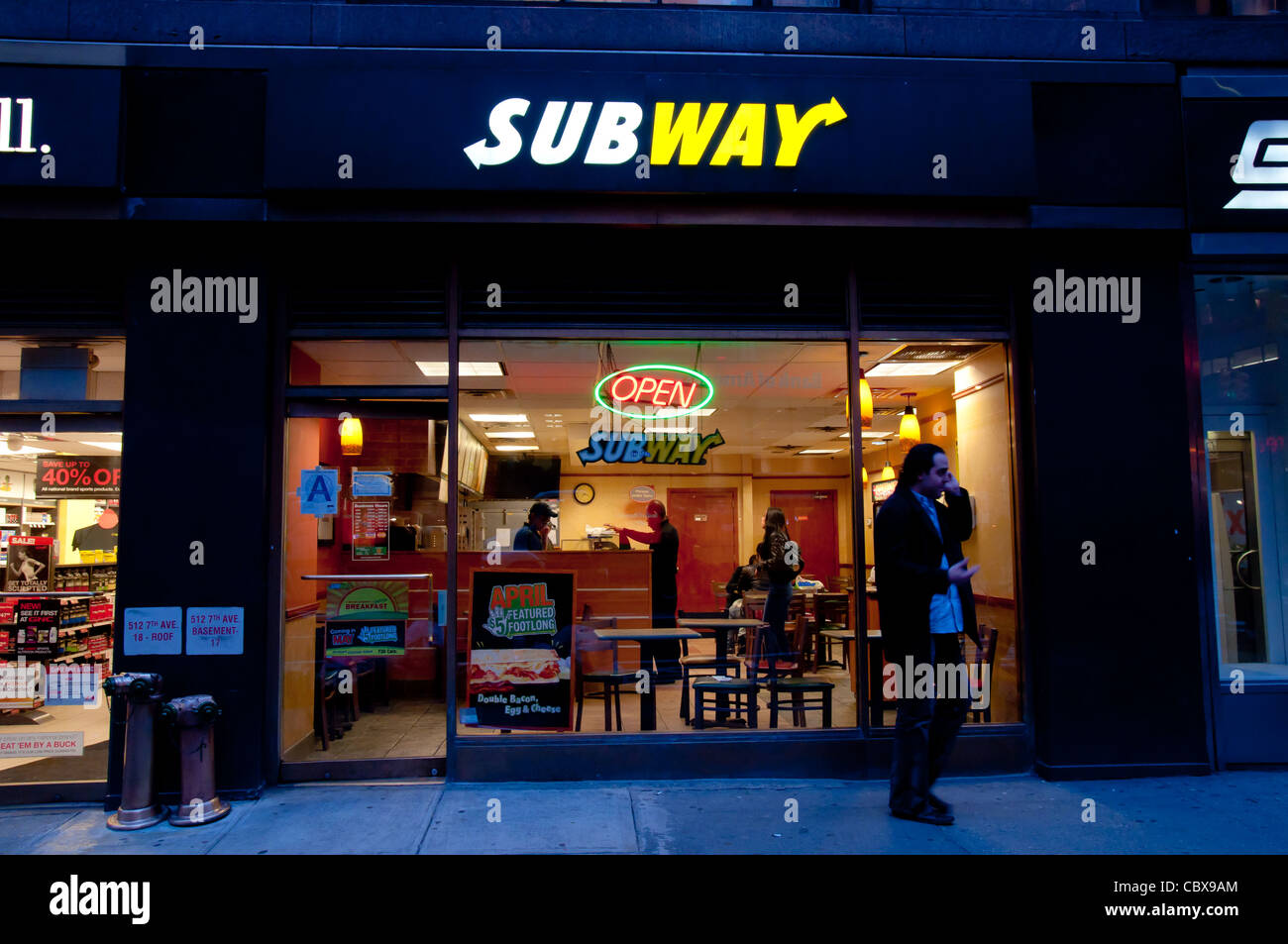 Fast food Subway restaurant in New York City at night Stock Photo