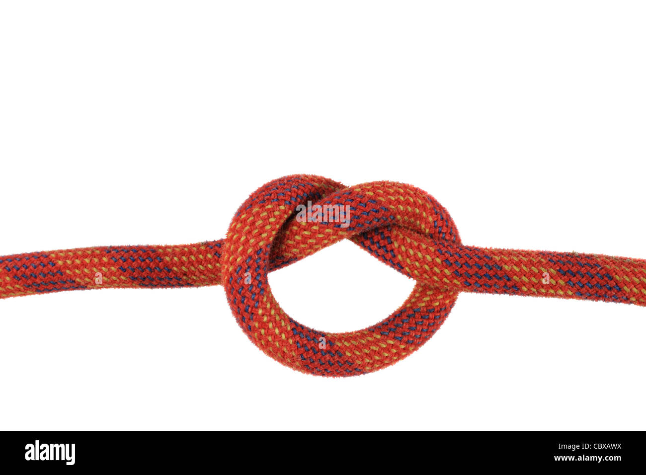 overhand or thumb knot in red climbing rope isolated on white Stock Photo