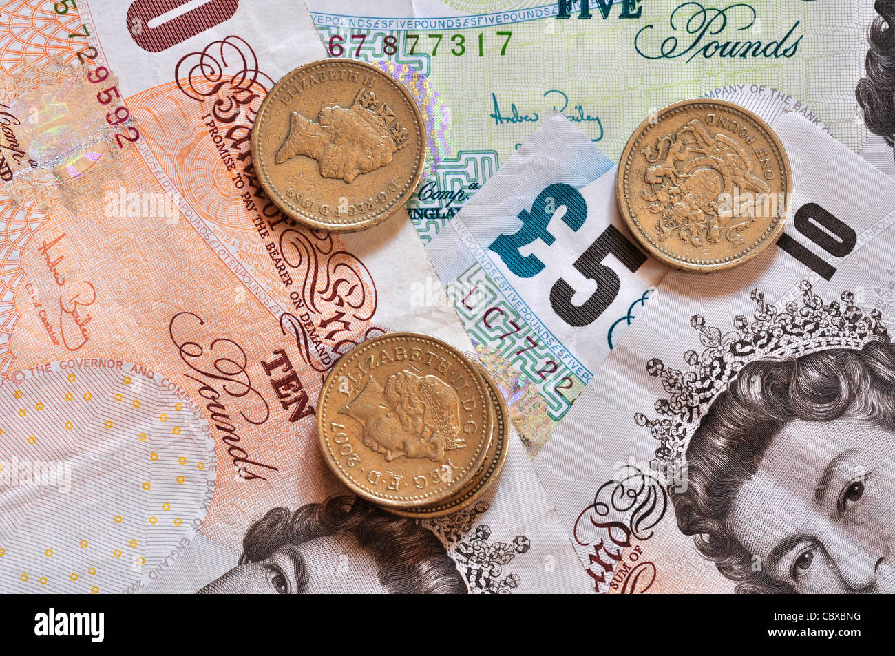 British currency - notes and coins UK Stock Photo