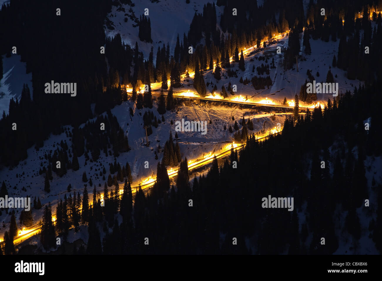 Night Road by mountain ski resort Chimbulak in Almaty, Kazakhstan Stock Photo