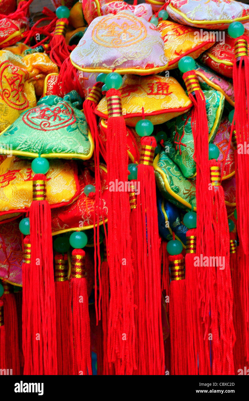 Chinese good luck offerings at Temple in Chengdu China Stock Photo