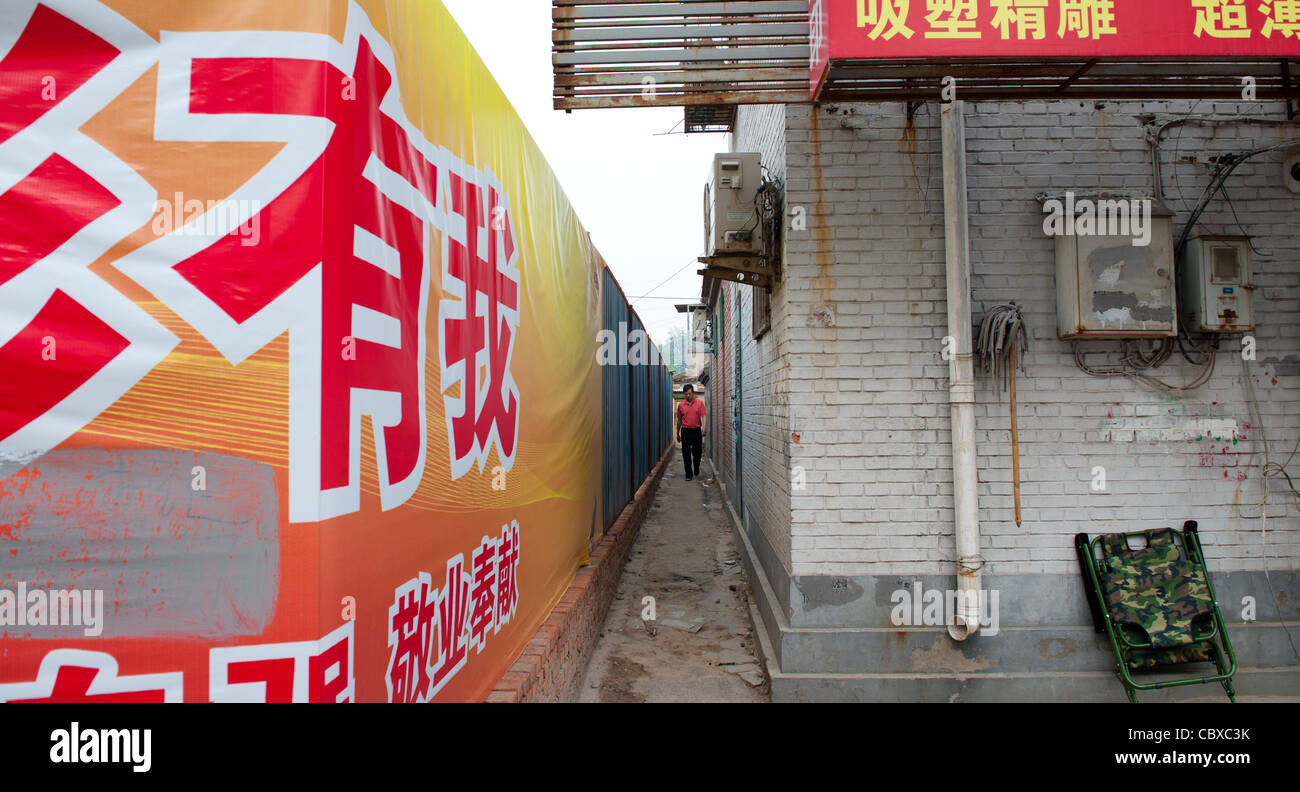 Tianshuiyuan, Beijing. Street scene of an area that is marked for demolition and new development. Stock Photo