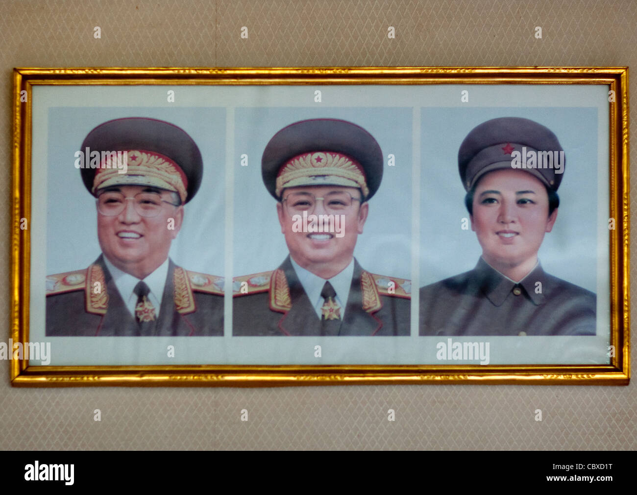 PROPAGANDA FRAME WITH THE TWO LEADERS PORTRAITS IN A BED AND BREAKFAST HOUSE, IN JUNG PYONG RI VILLAGE, NORTH KOREA Stock Photo