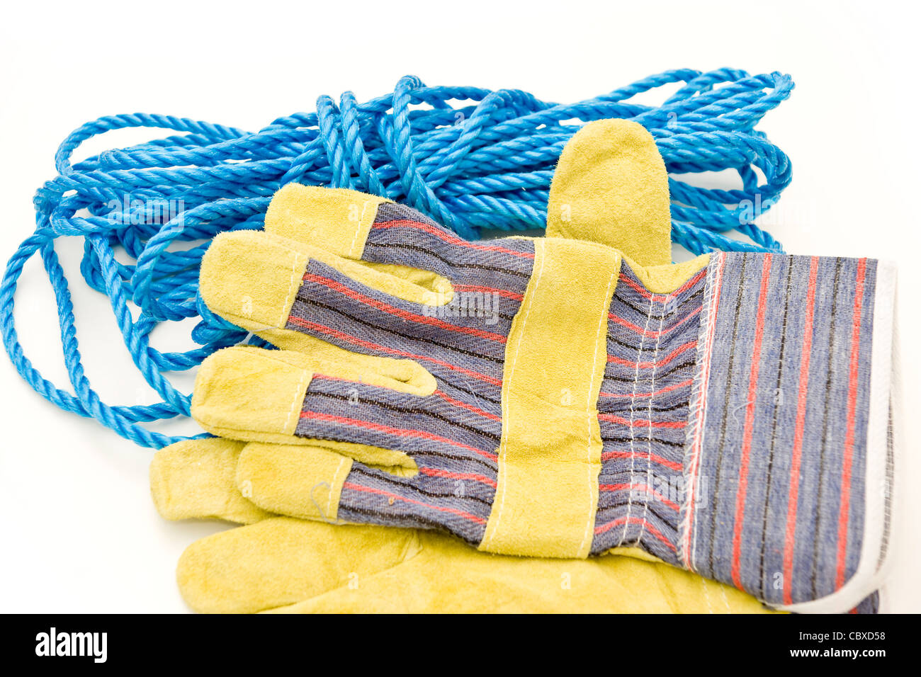 Rope and working gloves isolated on white Stock Photo Alamy