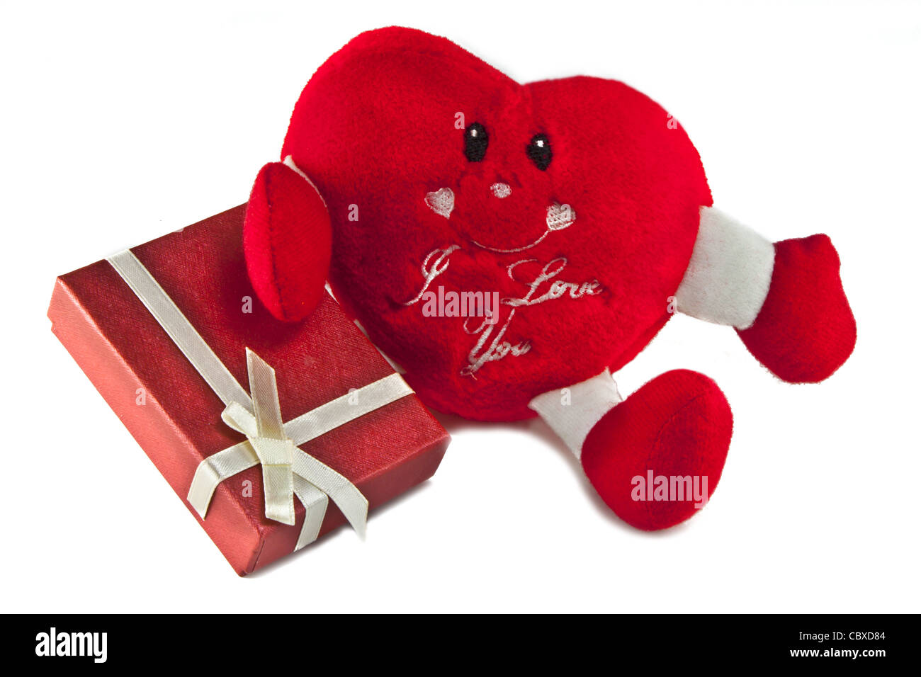 Photo of toy heart with a gift Stock Photo