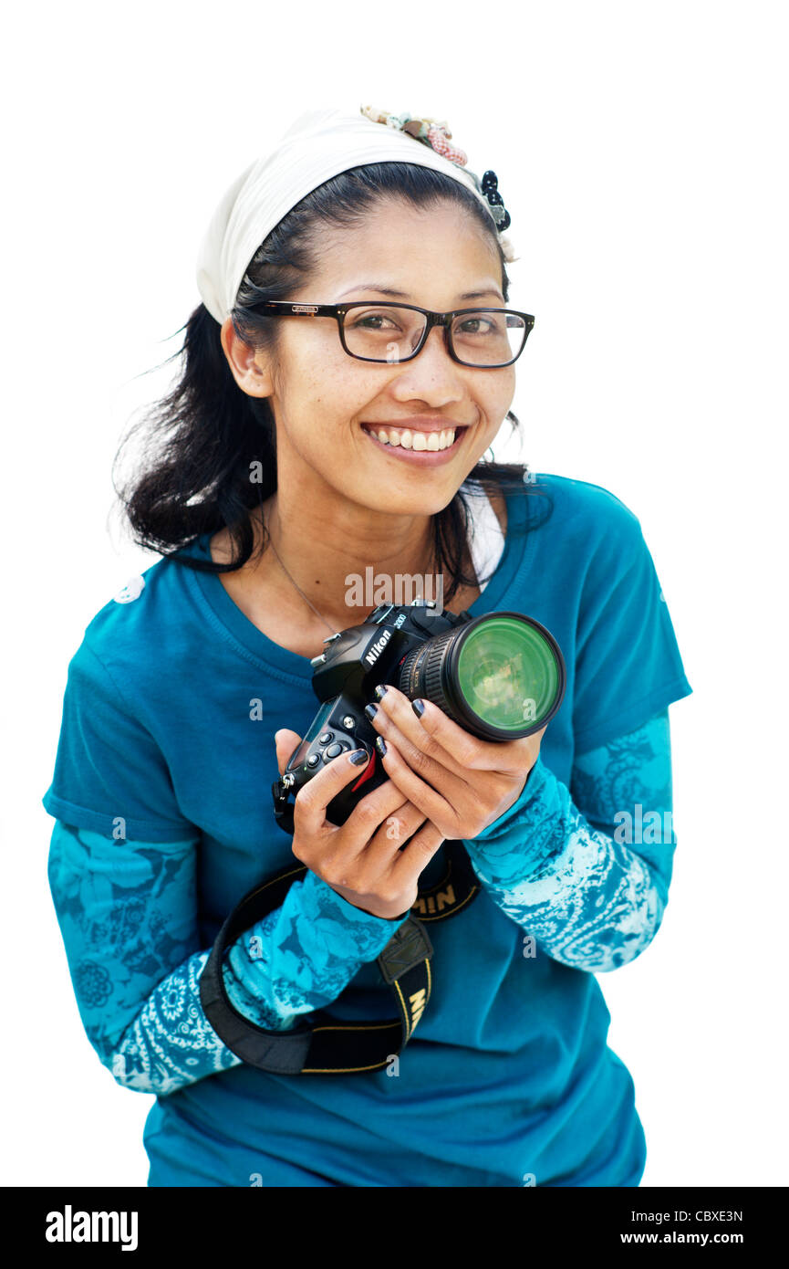 Thai woman with a Nikon DSLR camera, Thailand, Asia Stock Photo