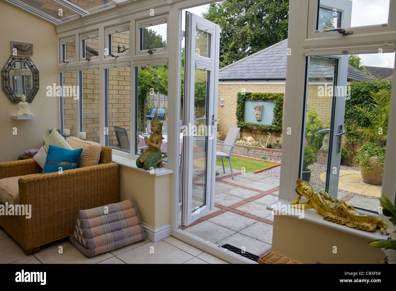A modern conservatory with PVC windows and doors in Bedfordshire, England Stock Photo