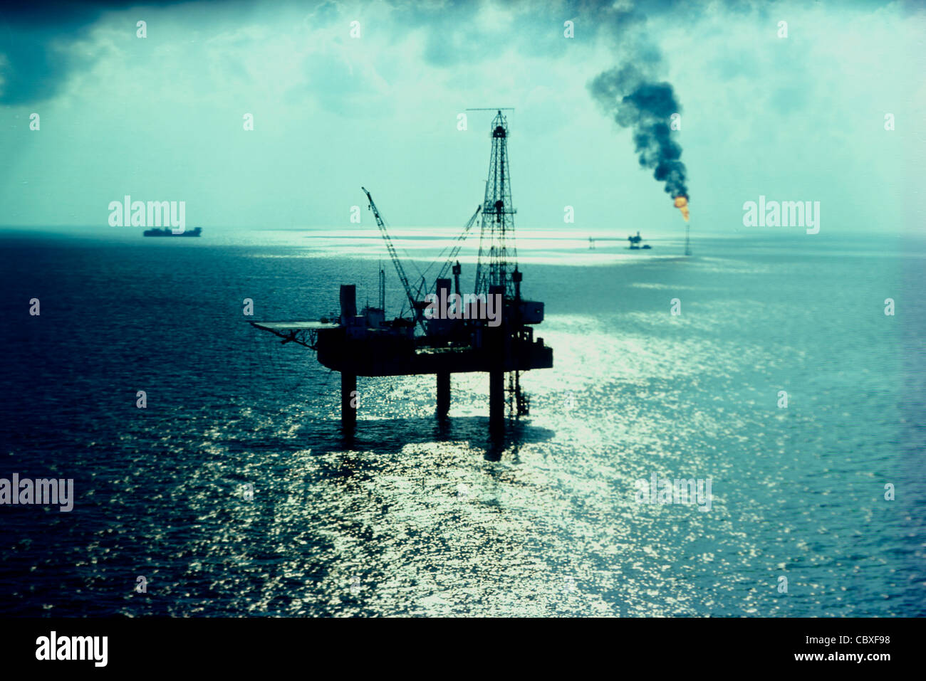 Oil drilling platform in the Lower Gulf off Sharjah, 1975, United Arab Emirates Stock Photo