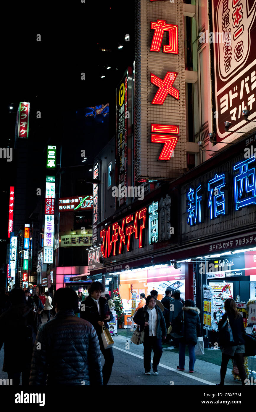 Tokyo city landscape with bright advertising lights at night Stock Photo