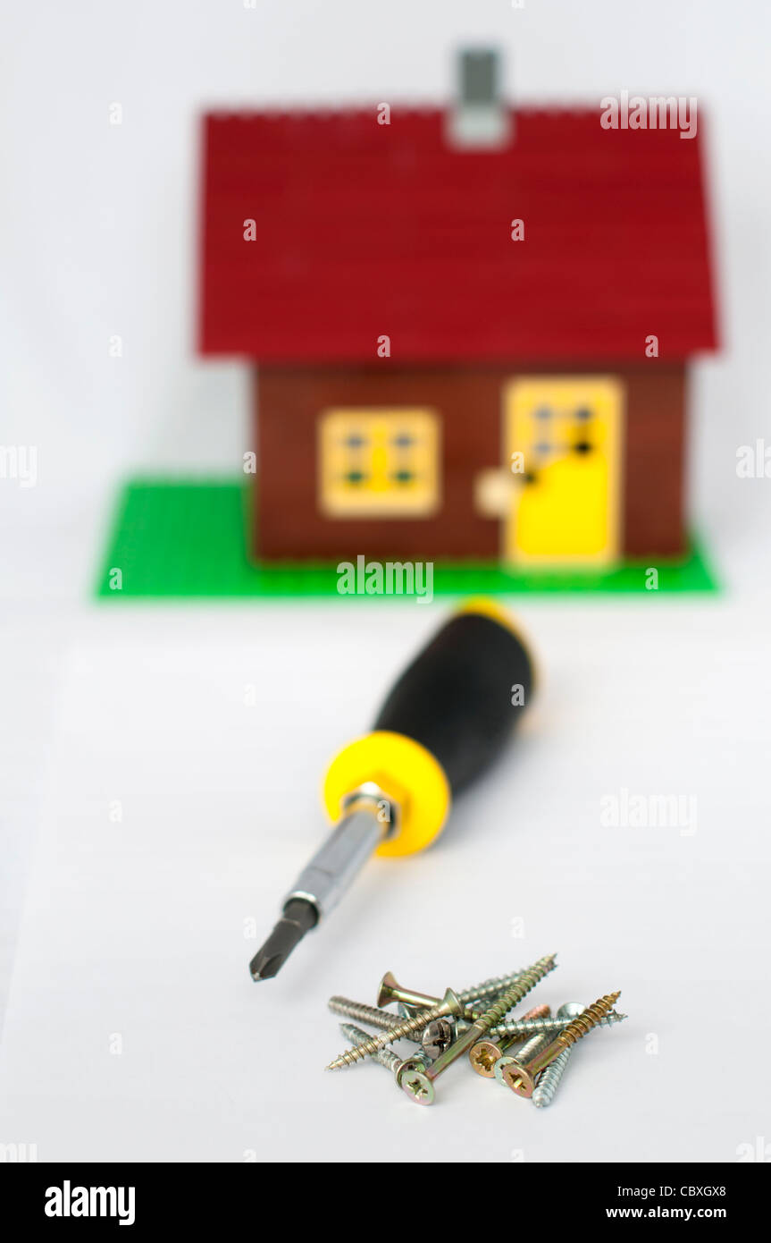 Repair and build house.Screwdriver and heap screws Stock Photo Alamy