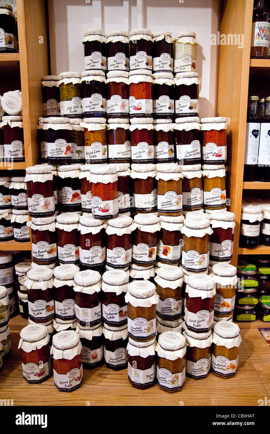Jars of traditional English jams and pickles for sale, Snape Maltings, Suffolk UK Stock Photo