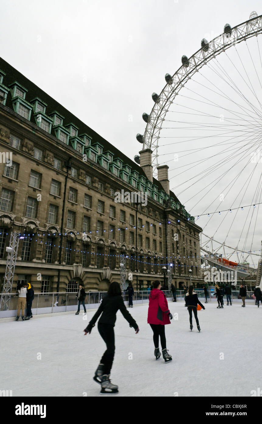 Ice skaters by the London Eye London England Great Britain UK Stock Photo