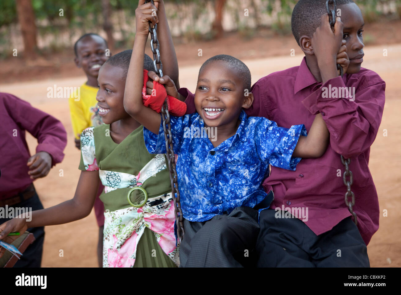 Children play on a playground in Morogoro, Tanzania, East Africa. Stock Photo
