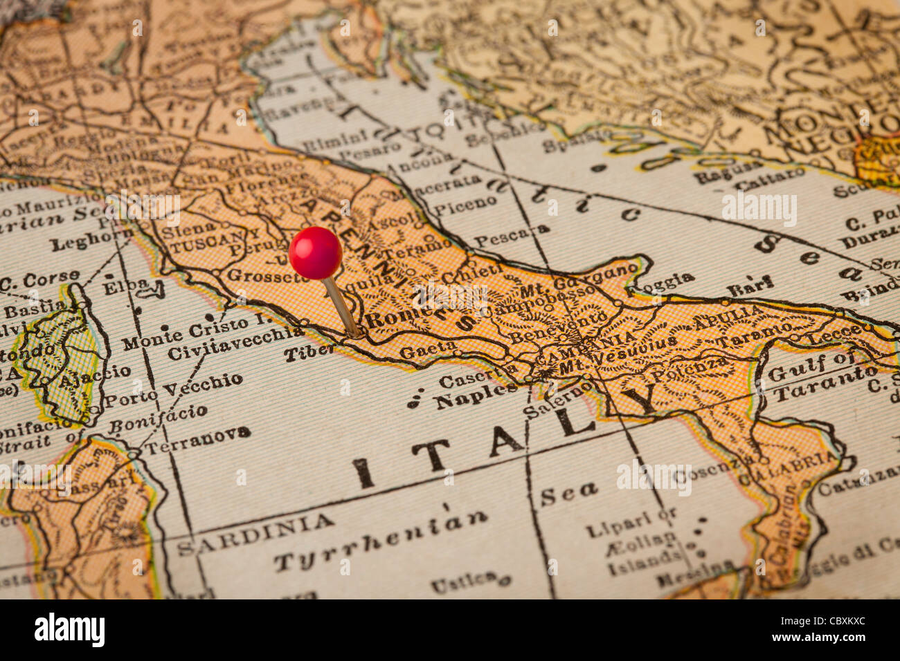 Italy vintage 1920s map (printed in 1926 - copyrights expired) with a red pushpin on Rome, selective focus Stock Photo
