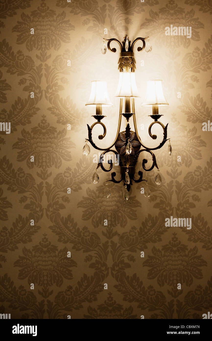 Stylish lamp on the wallpaper Stock Photo