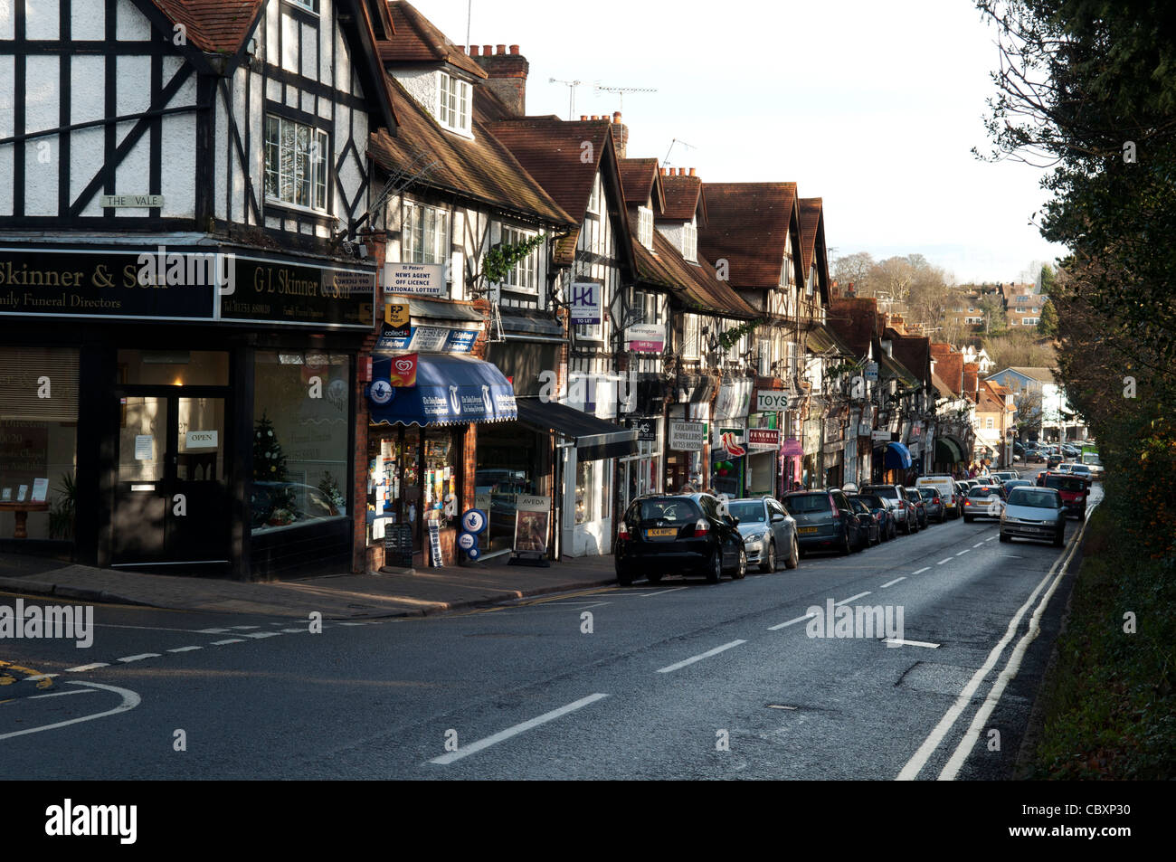 A traditional row of small shops and businesses in Market Place Chalfont St Peter village centre Bucks UK Stock Photo