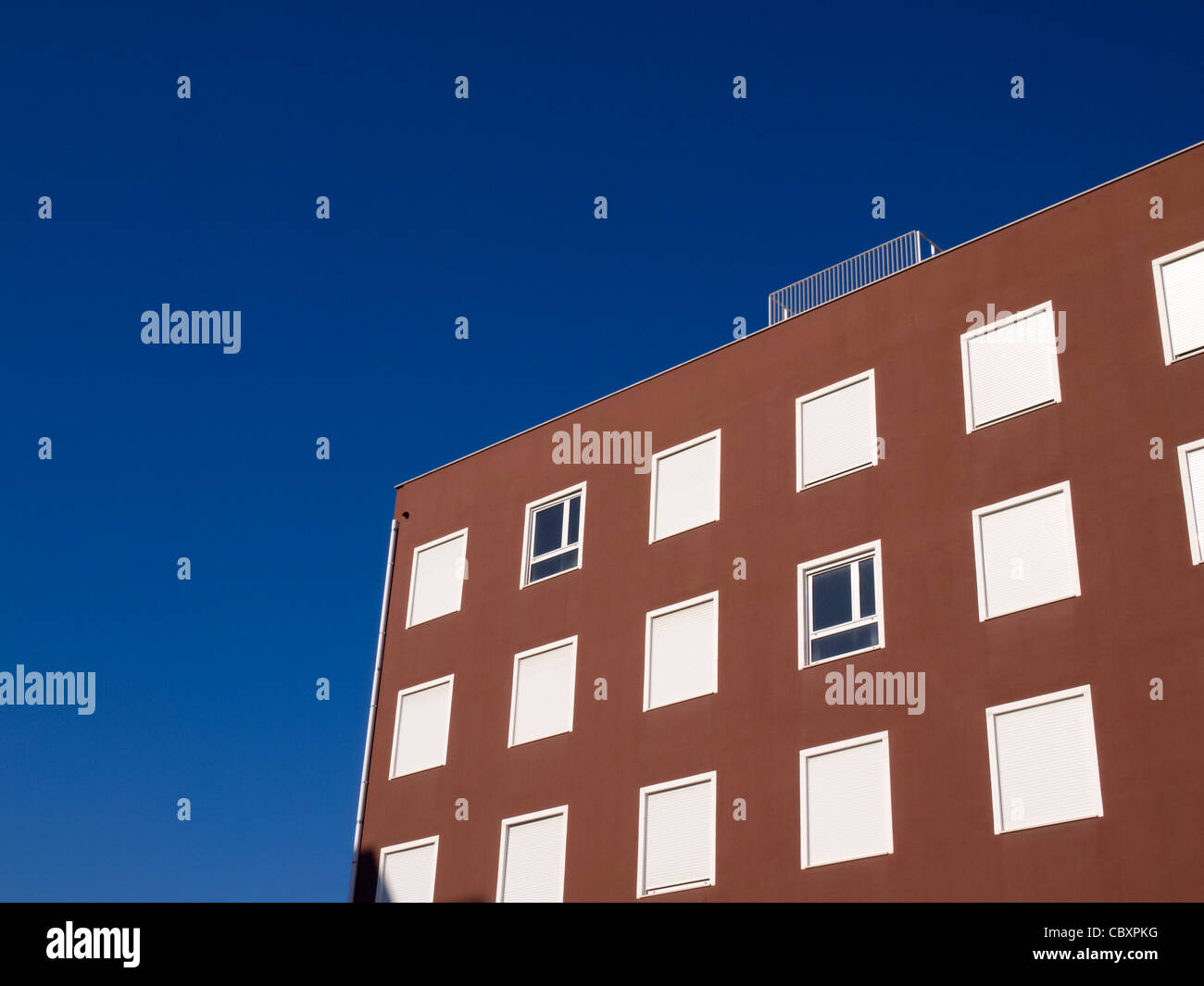 Modern colourful apartment building facade against a blue sky Stock ...