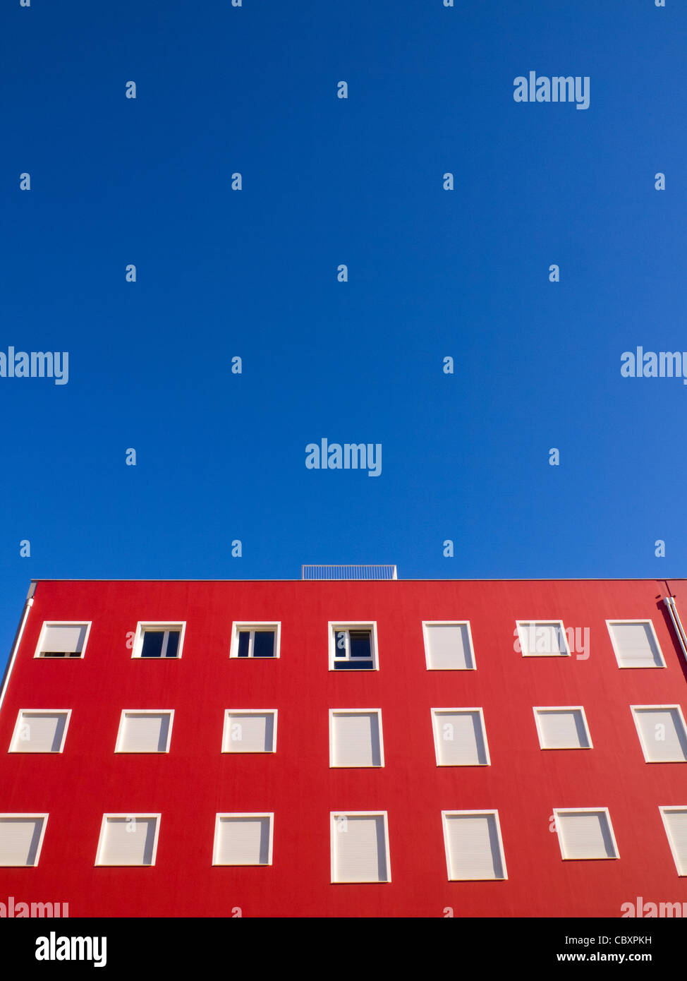 Modern colourful apartment building facade against a blue sky Stock ...