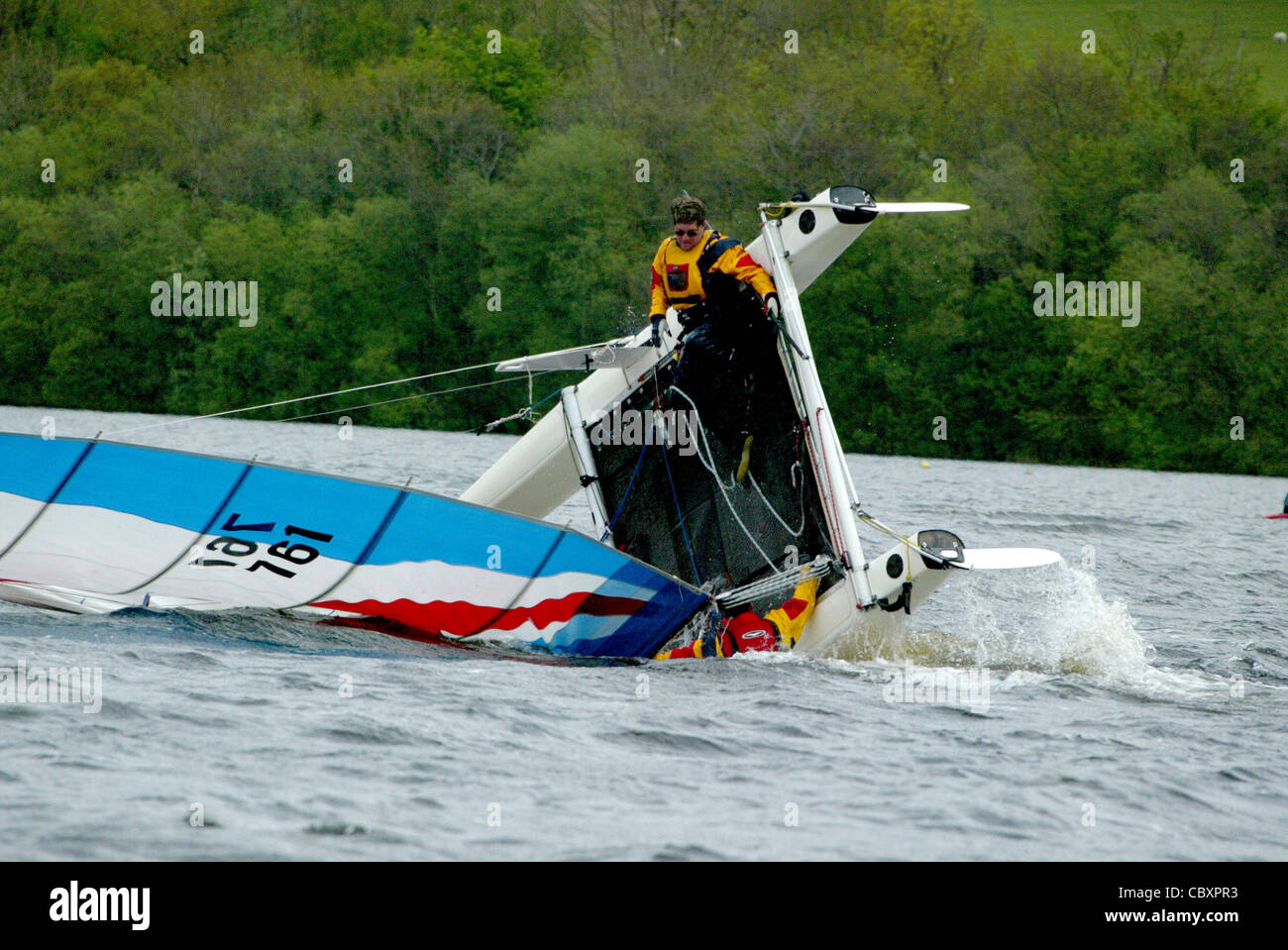 A high speed catamaran pitch poles and crashes in high wind on Bala Lake in North Wales Stock Photo