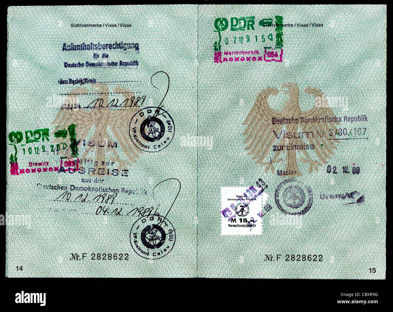 Passport of the Federal Republic of Germany with the remark of a right of residence in the GDR and the visas of the police. Stock Photo