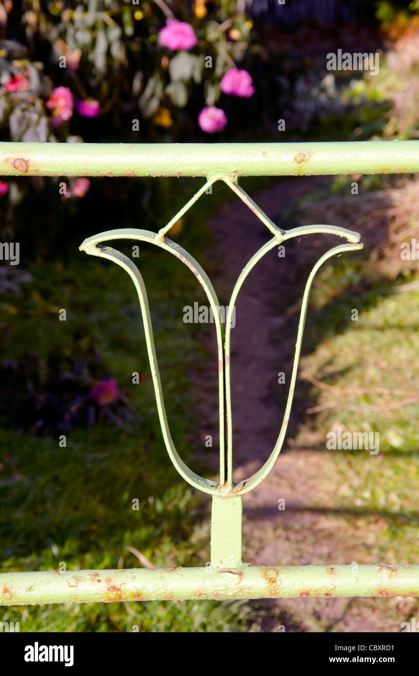 Steel balcony railing fragment natural garden in the background. Metal ...