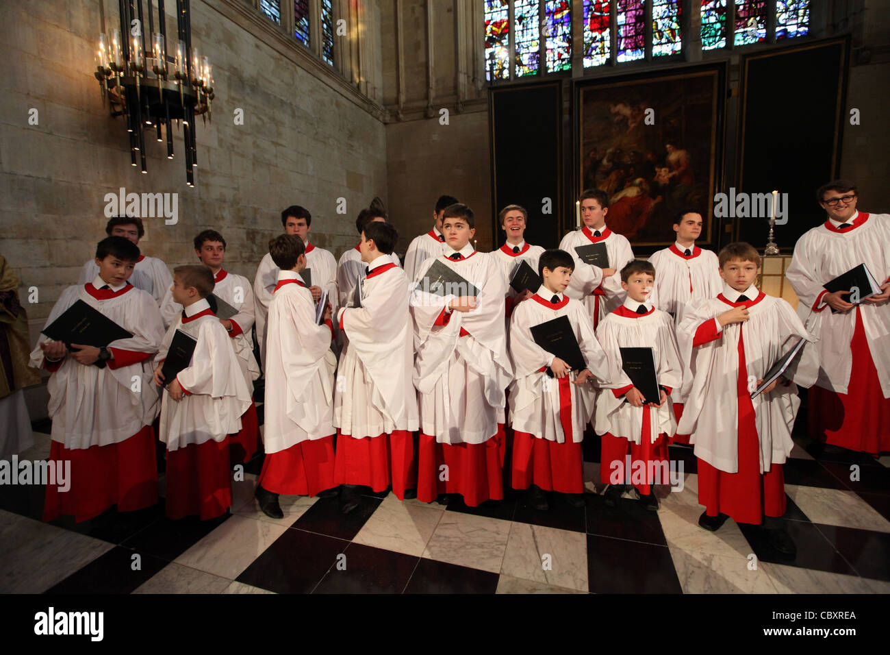 KING'S COLLEGE CHOIR BOYS PREPARING FOR THE CHRISTMAS EVE SERVICE AT