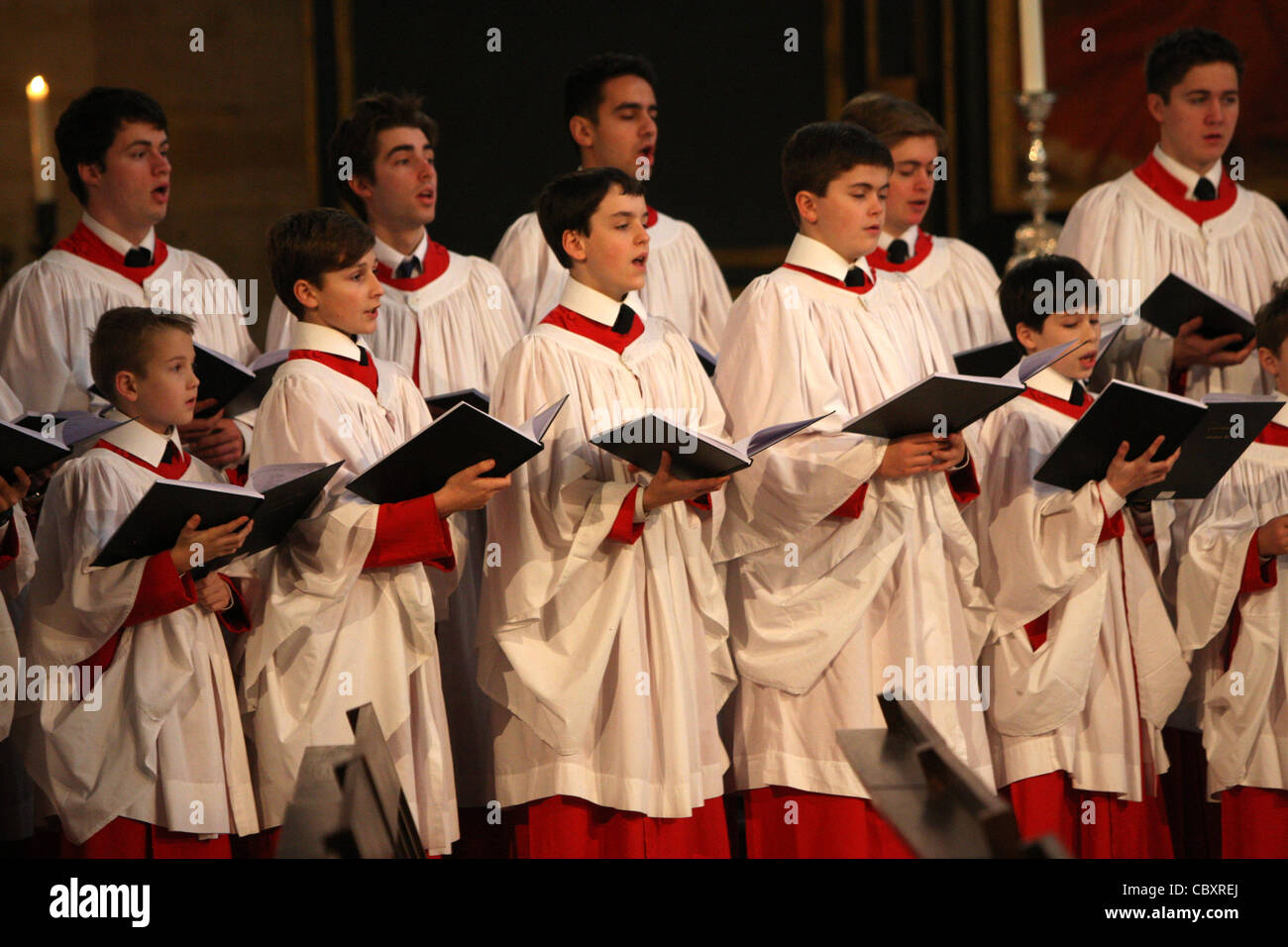 KING'S COLLEGE CHOIR BOYS PREPARING FOR THE CHRISTMAS EVE SERVICE AT