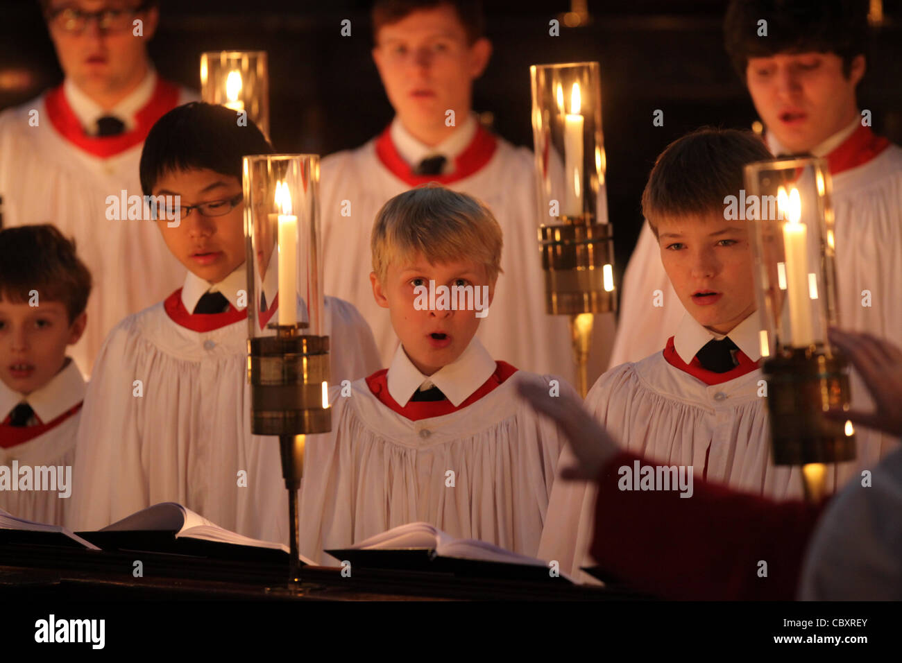 KING'S COLLEGE CHOIR BOYS PREPARING FOR THE CHRISTMAS EVE SERVICE AT